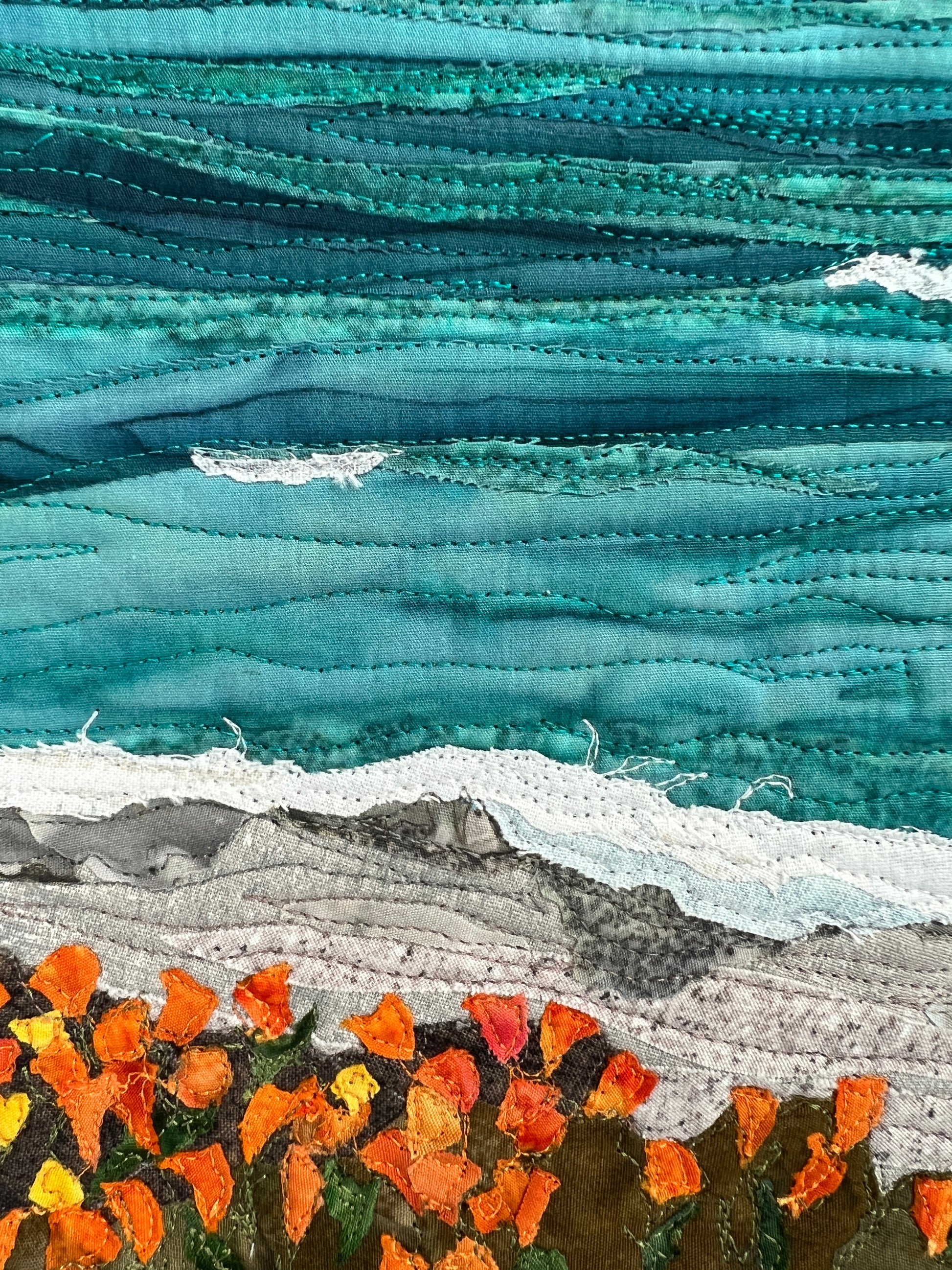 Detail image of textile art with poppies, California Coast textile art